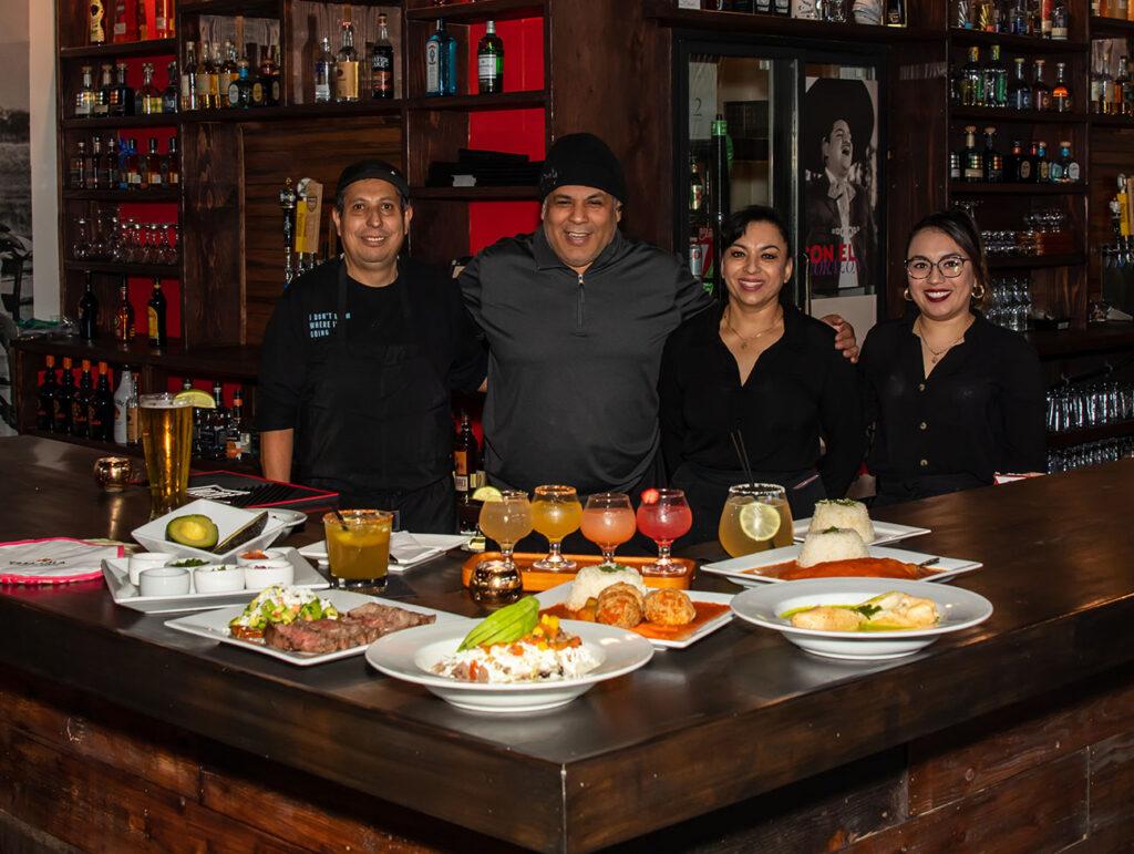 The owners warmly smile