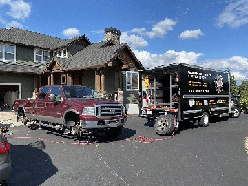 503 Mobile tire repair working on vehicle.