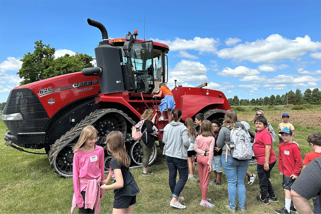 3rd Grade Canby students look at farm equipment