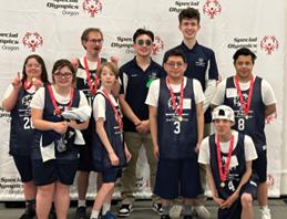 Special Olympic Pose with Their Medals