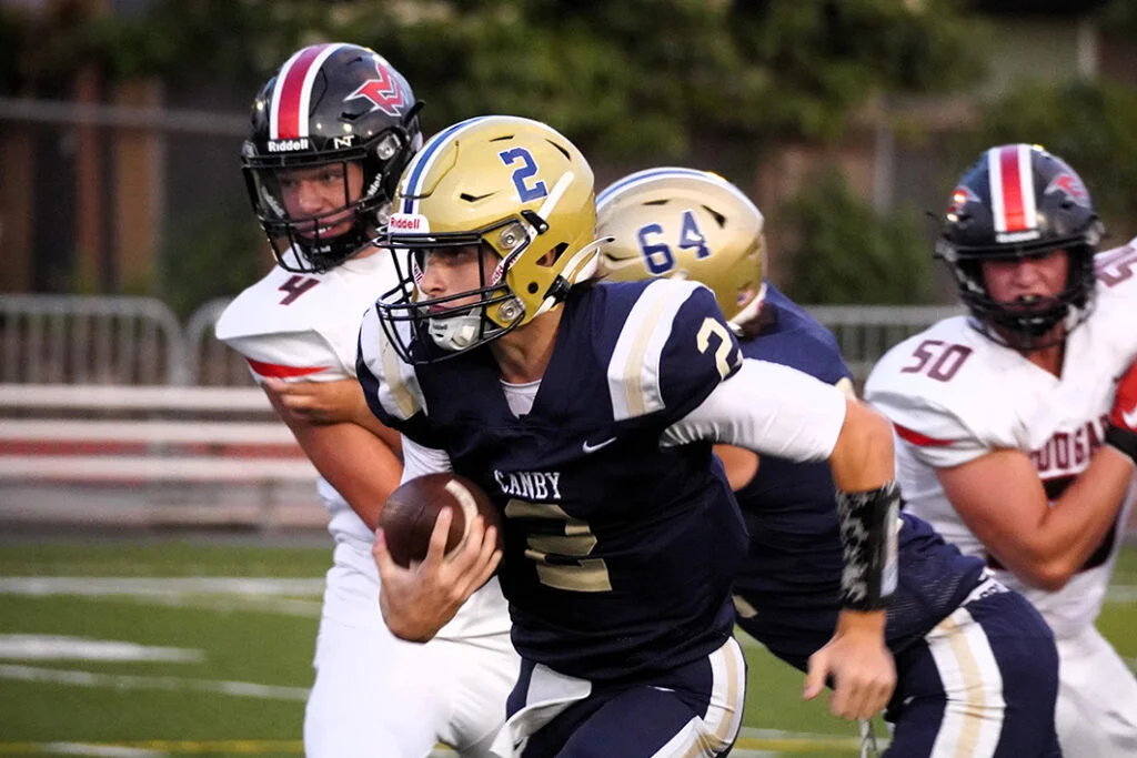 Canby Cougars Football Player Runs The Ball