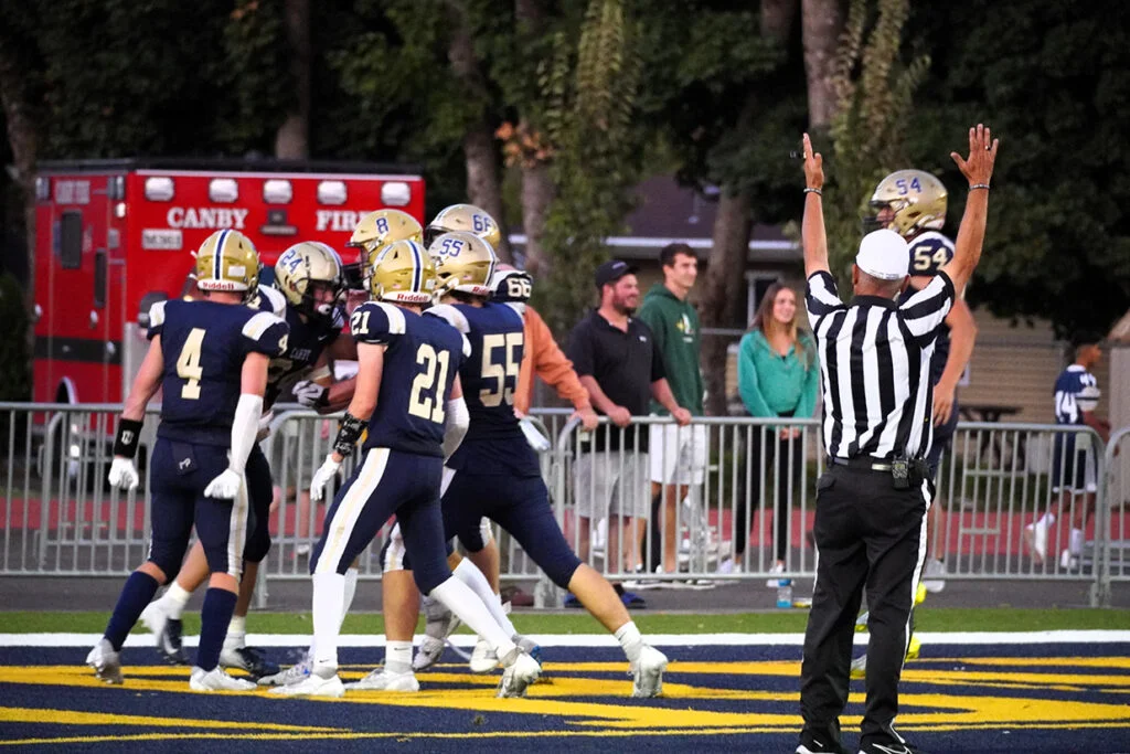 Canby Cougars Football Team on the field
