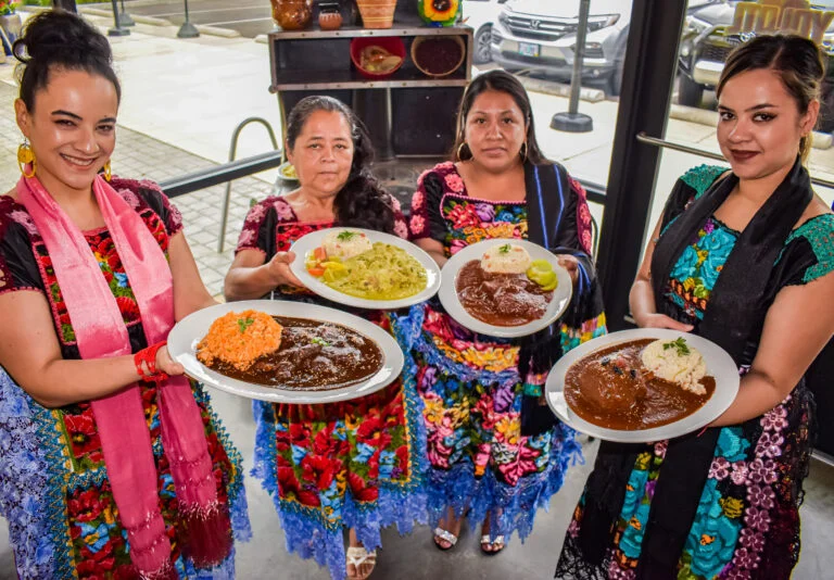 The woman of Yolotl Mexican Cuisine offer authentic dishes